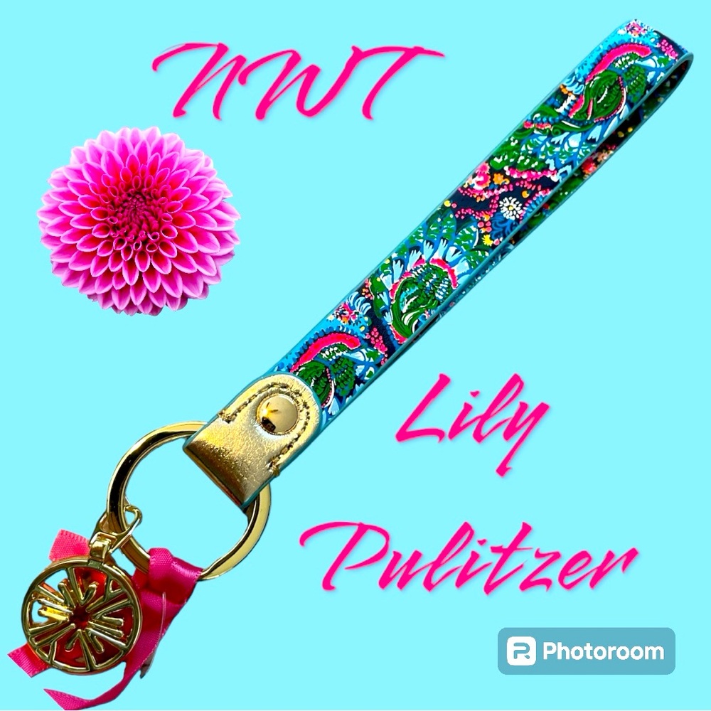 NWT. Lily Pulitzer Strap Keychain.Leatherette Material.Lily Logo Charm.